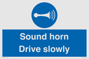 sound-horn-drive-slowly-warehousing-and-delivery-sign~